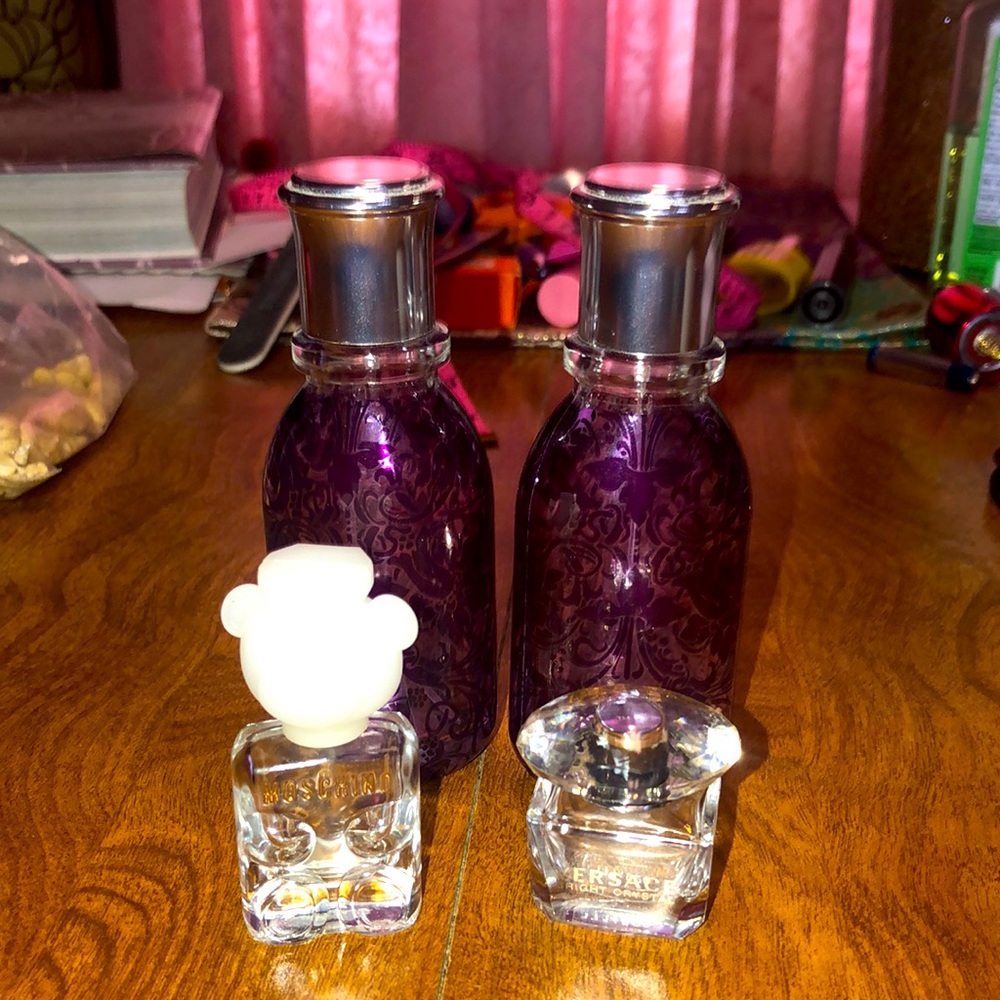 (4) Empty Bottles of Designer Perfumes